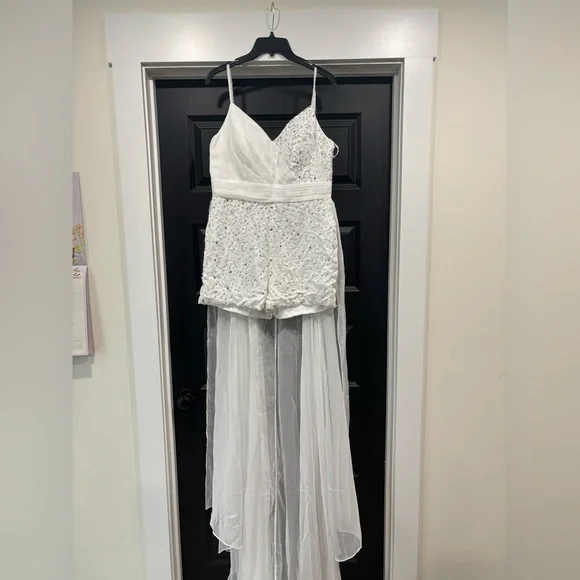 Elegant Sparkly White Romper with Train